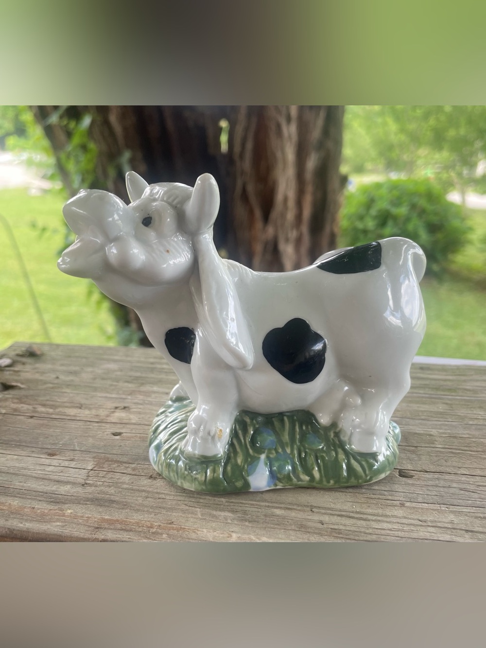 Whimsical White Ceramic Cow Figurine with Black Spots